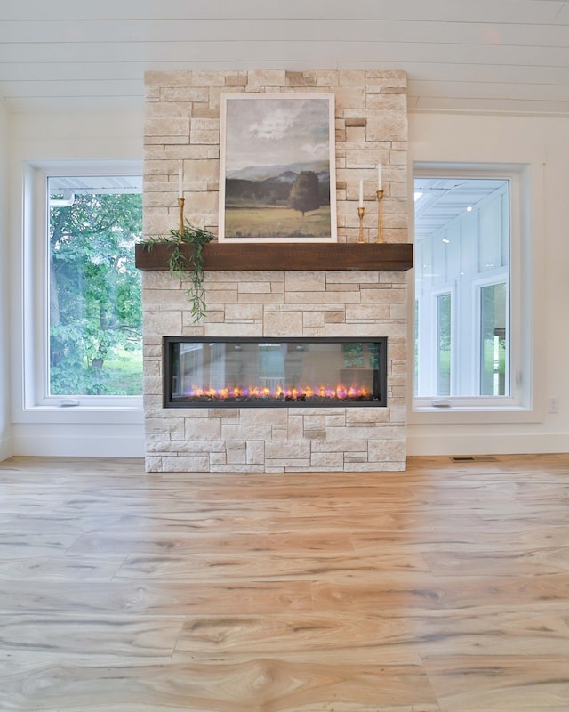20482 Lord Rd, Center Twp, MN 56465 - detailed view of a stone fireplace and wood finished floors
