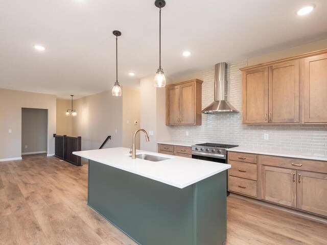 5393 177th St W, Lakeville, MN 55044 - kitchen with a sink, wall chimney exhaust hood, decorative backsplash, light wood-type flooring, and recessed lighting