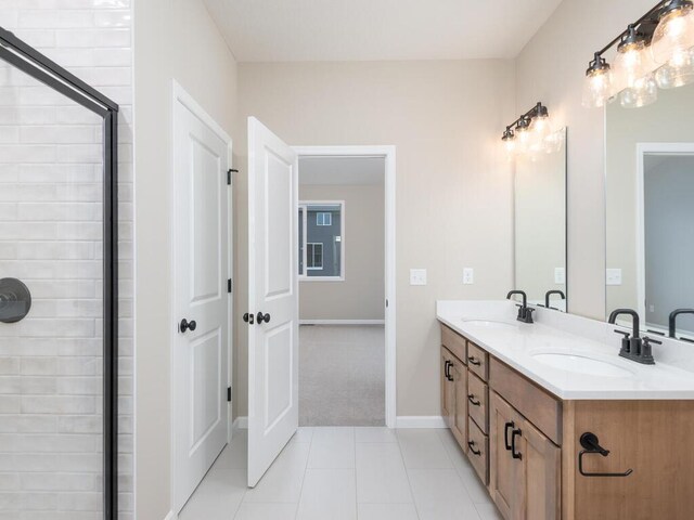 5393 177th St W, Lakeville, MN 55044 - full bath with double vanity, tile patterned flooring, tiled shower, and baseboards