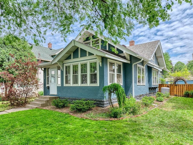 3429 31st Ave S, Minneapolis, MN 55406 - view of front of home with a chimney and a shingled roof