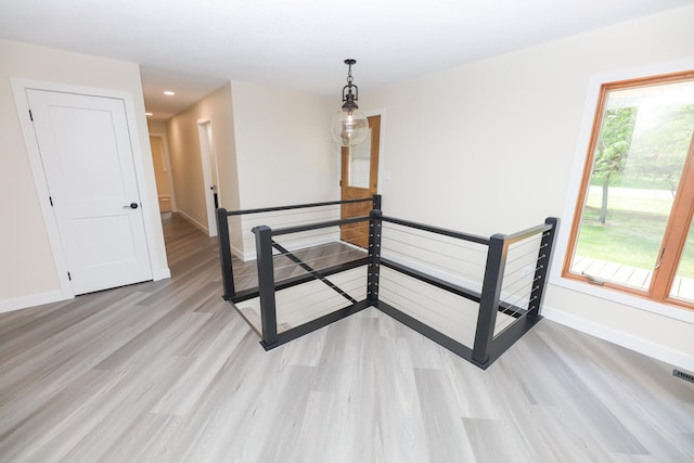 1202 Ridgeview Ter NE, Alexandria, MN 56308 - spare room featuring light wood-style floors, baseboards, and recessed lighting