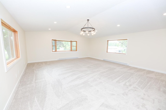 1202 Ridgeview Ter NE, Alexandria, MN 56308 - empty room featuring a baseboard heating unit, light colored carpet, healthy amount of natural light, vaulted ceiling, and recessed lighting