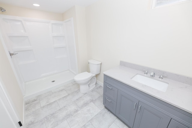1202 Ridgeview Ter NE, Alexandria, MN 56308 - full bathroom featuring vanity, toilet, a shower, and baseboards