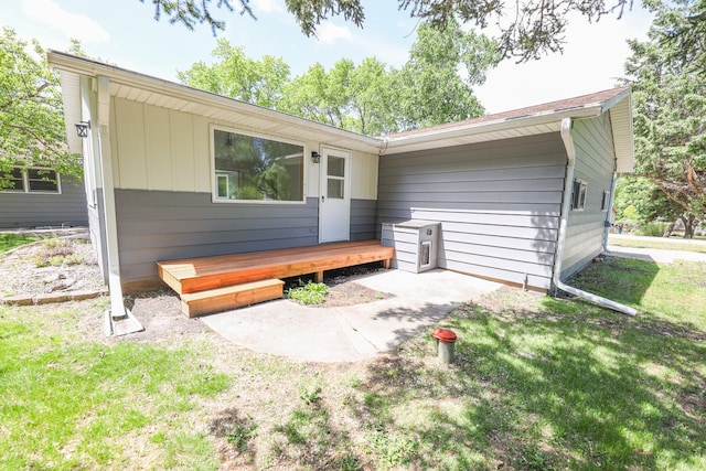1202 Ridgeview Ter NE, Alexandria, MN 56308 - rear view of house with a deck