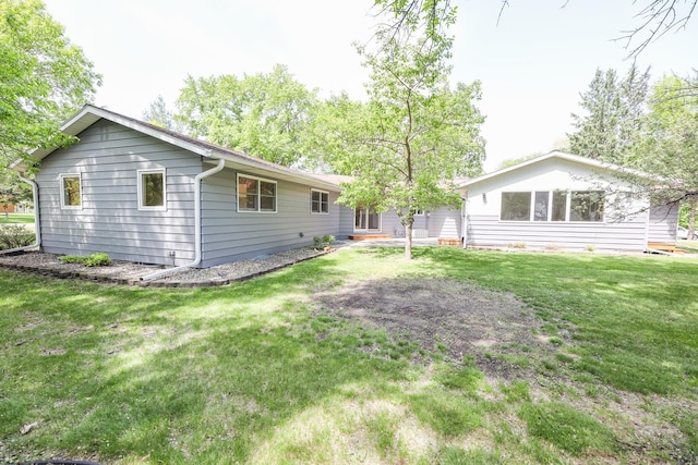 1202 Ridgeview Ter NE, Alexandria, MN 56308 - back of house with a yard