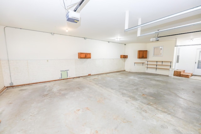 1202 Ridgeview Ter NE, Alexandria, MN 56308 - garage featuring a garage door opener