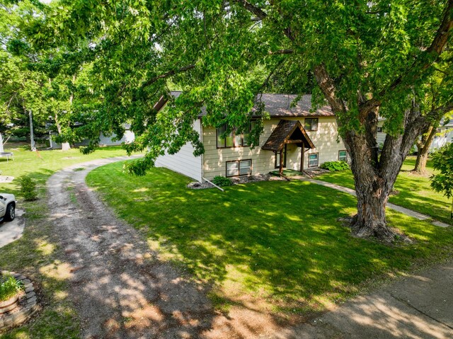 1646 5th St, Montevideo, MN 56265 - view of front of house with a front yard