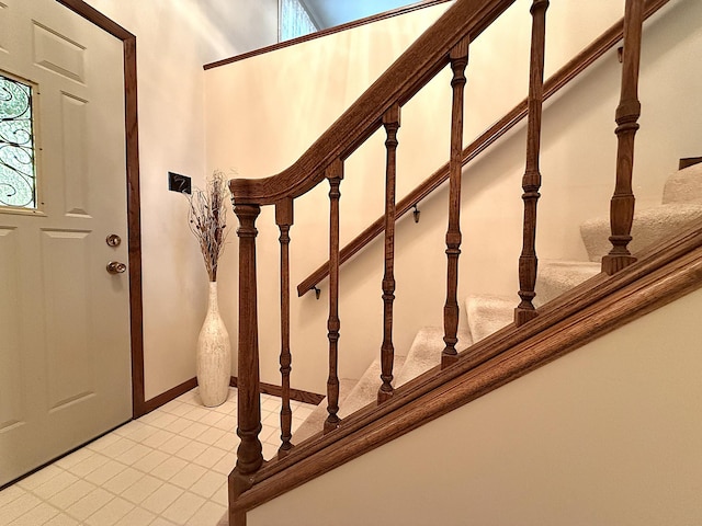 1646 5th St, Montevideo, MN 56265 - entryway with stairway and light tile patterned flooring