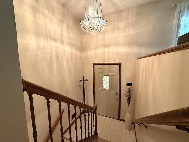 1646 5th St, Montevideo, MN 56265 - foyer entrance with stairs and a chandelier