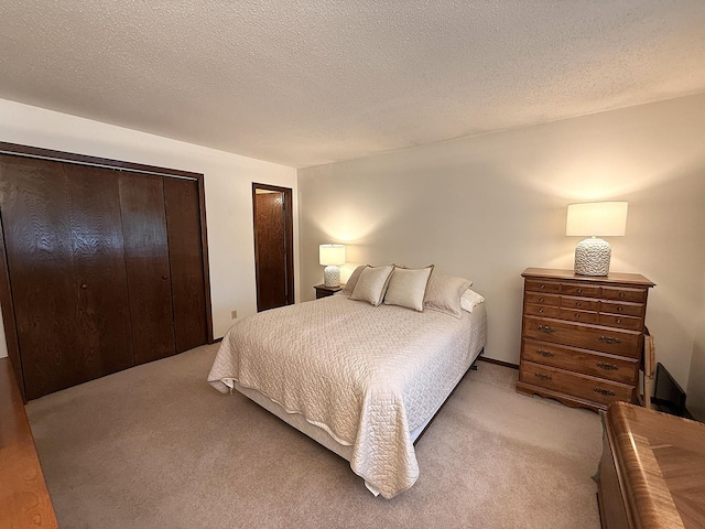 1646 5th St, Montevideo, MN 56265 - bedroom featuring light colored carpet and multiple closets