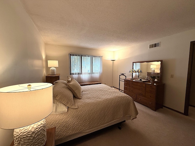1646 5th St, Montevideo, MN 56265 - bedroom featuring light colored carpet and a textured ceiling