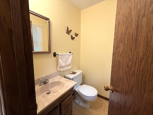 1646 5th St, Montevideo, MN 56265 - half bath with toilet, vanity, and baseboards