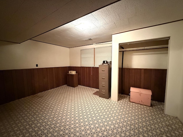 1646 5th St, Montevideo, MN 56265 - finished basement with a wainscoted wall and wood walls