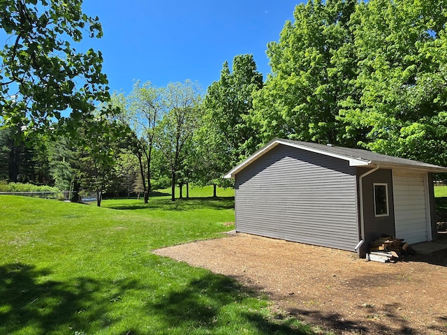 4230 Odegard Ave N, Baytown Twp, MN 55082 - view of grassy yard featuring an outbuilding and view of scattered trees