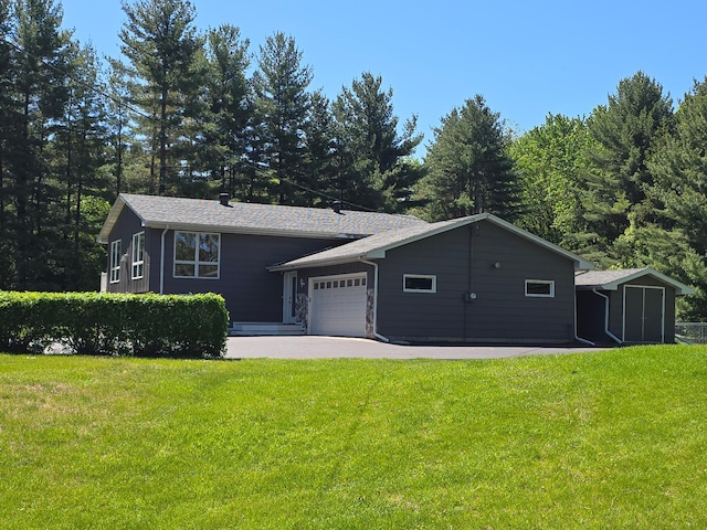 4230 Odegard Ave N, Baytown Twp, MN 55082 - view of front of home featuring a garage and a front yard