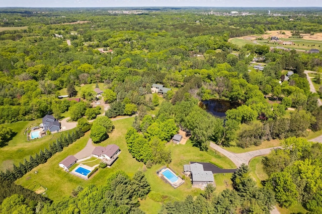 4230 Odegard Ave N, Baytown Twp, MN 55082 - drone / aerial view of a heavily wooded area and a pool area