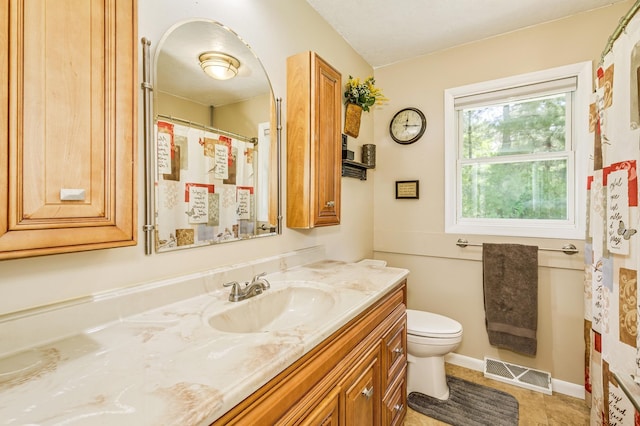 4230 Odegard Ave N, Baytown Twp, MN 55082 - bathroom featuring vanity, toilet, and tile patterned floors