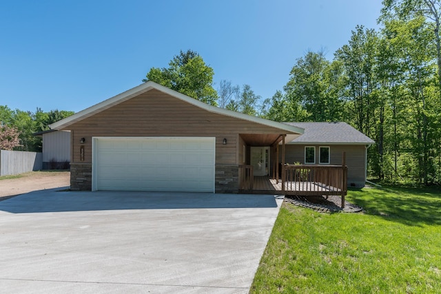 8296 Gladstone Lake Rd, Lake Edward Twp, MN 56401 - single story home featuring concrete driveway, a front yard, a wooden deck, a garage, and stone siding