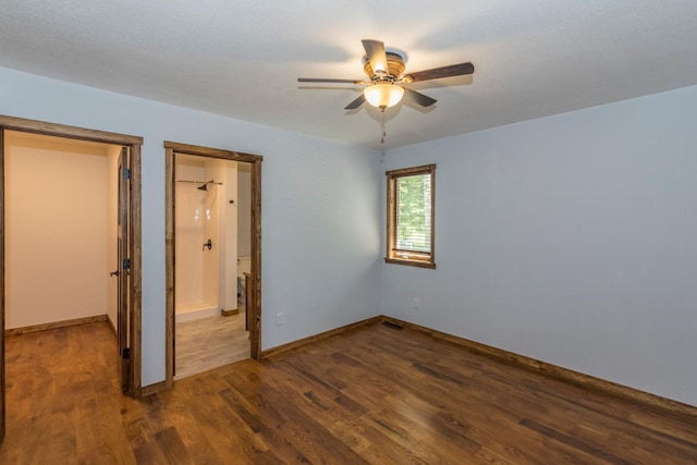 8296 Gladstone Lake Rd, Lake Edward Twp, MN 56401 - unfurnished bedroom with wood finished floors, baseboards, and ceiling fan