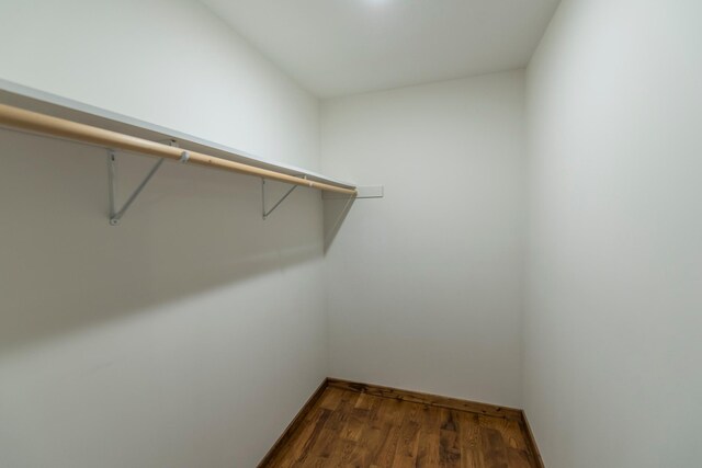 8296 Gladstone Lake Rd, Lake Edward Twp, MN 56401 - spacious closet featuring dark wood-style flooring