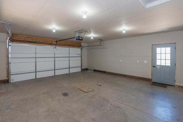 8296 Gladstone Lake Rd, Lake Edward Twp, MN 56401 - garage featuring a garage door opener and baseboards