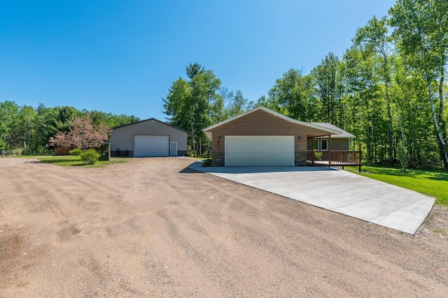 8296 Gladstone Lake Rd, Lake Edward Twp, MN 56401 - single story home with a detached garage, stone siding, and an outdoor structure