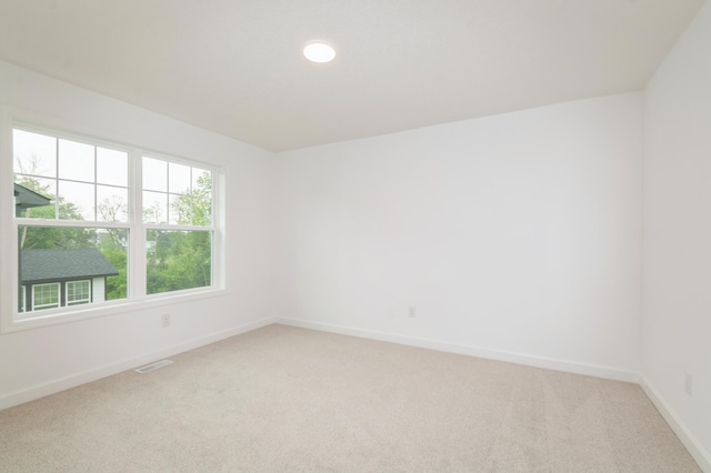 20117 63rd Ave, Corcoran, MN 55340 - empty room featuring light colored carpet and recessed lighting