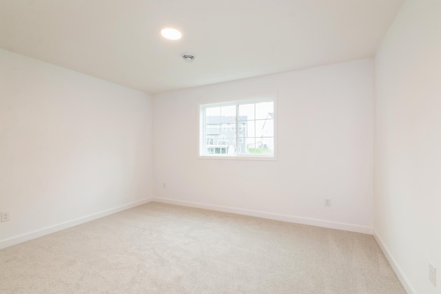 20117 63rd Ave, Corcoran, MN 55340 - unfurnished room with light colored carpet and baseboards