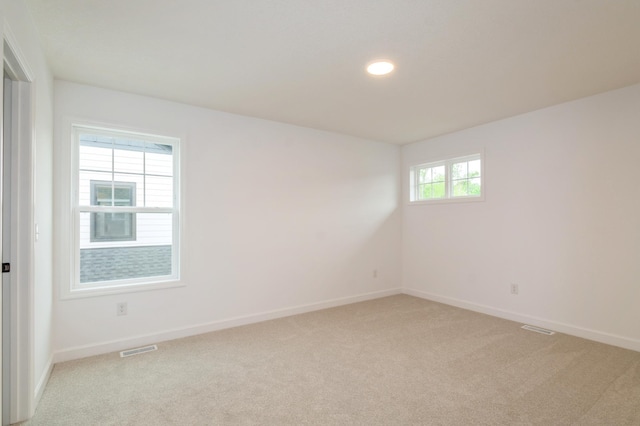 20117 63rd Ave, Corcoran, MN 55340 - unfurnished room featuring light colored carpet and recessed lighting
