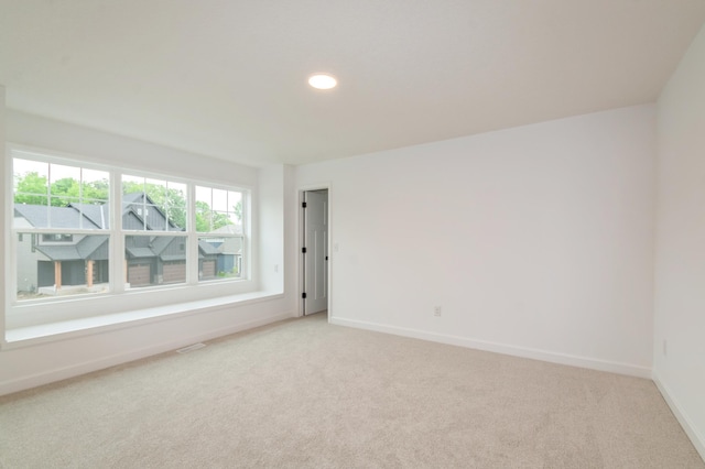 20117 63rd Ave, Corcoran, MN 55340 - unfurnished room featuring light carpet and recessed lighting