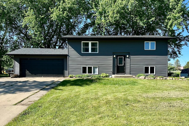 505 Meadow Lark Ln, Dodge Center, MN 55927 - bi-level home with a garage, driveway, and a front yard