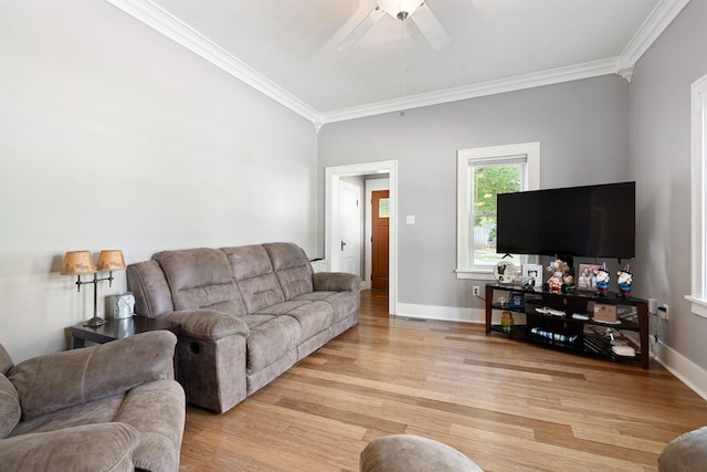 1001 2nd Ave SW, Austin, MN 55912 - living area with light wood-style flooring, crown molding, ceiling fan, and baseboards