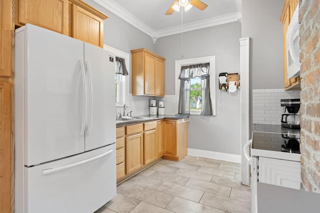 1001 2nd Ave SW, Austin, MN 55912 - kitchen featuring freestanding refrigerator, backsplash, a ceiling fan, crown molding, and light brown cabinets