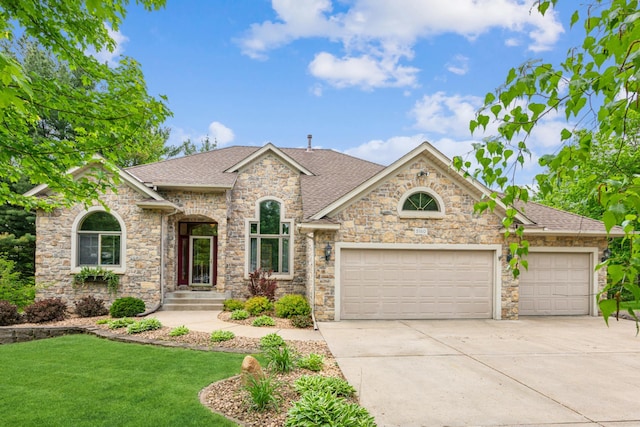 5160 202nd Ln NE, Linwood Twp, MN 55092 - french country home featuring a garage, driveway, roof with shingles, and a front lawn
