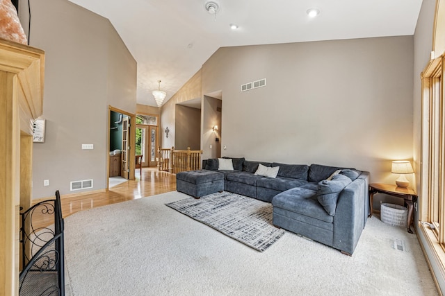 5160 202nd Ln NE, Linwood Twp, MN 55092 - living area with light colored carpet and high vaulted ceiling