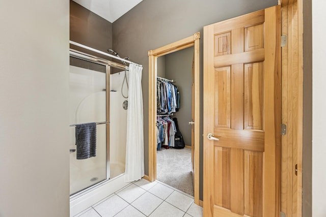 5160 202nd Ln NE, Linwood Twp, MN 55092 - full bath with a shower stall, tile patterned flooring, and a walk in closet