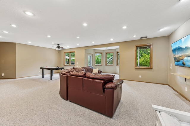 5160 202nd Ln NE, Linwood Twp, MN 55092 - living area featuring light colored carpet, baseboards, recessed lighting, and a ceiling fan