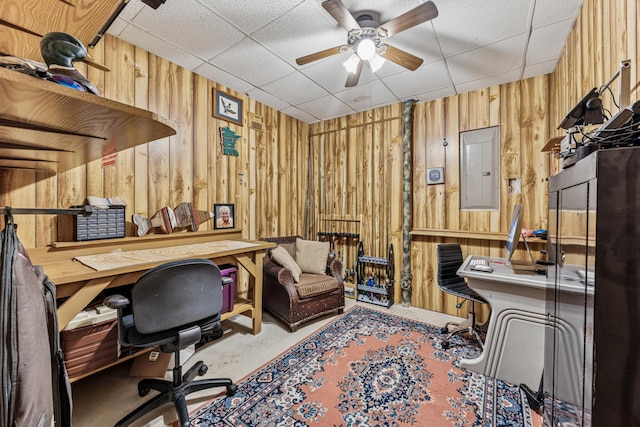 5160 202nd Ln NE, Linwood Twp, MN 55092 - office with electric panel, wooden walls, a drop ceiling, ceiling fan, and concrete floors