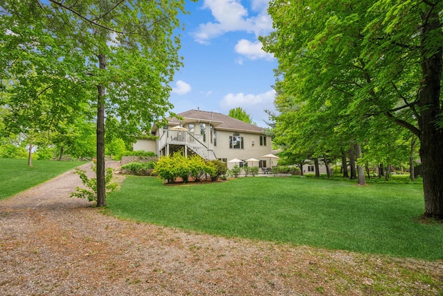 5160 202nd Ln NE, Linwood Twp, MN 55092 - view of front of house with stairs and a front yard