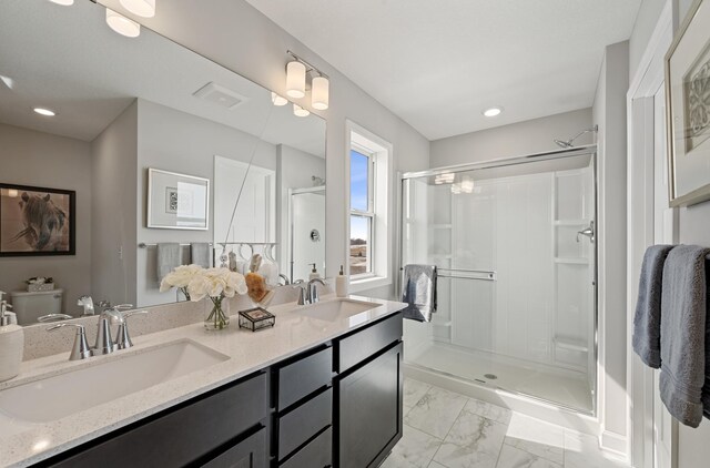 1955 Fulton Rd, Carver, MN 55315 - full bathroom with marble look tile flooring, double vanity, a shower stall, and recessed lighting