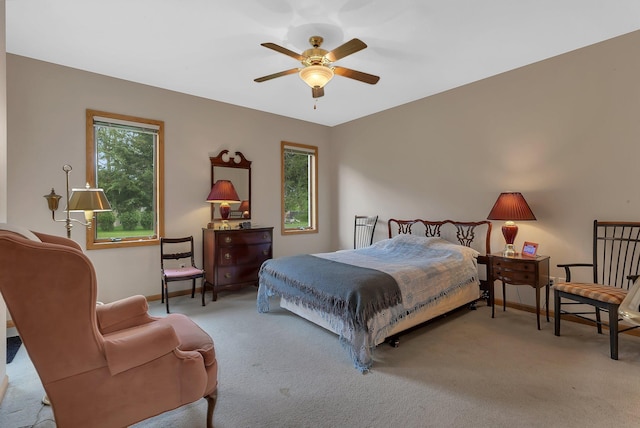 1538 Katrina Ct, Saint Cloud, MN 56301 - carpeted bedroom featuring baseboards and a ceiling fan