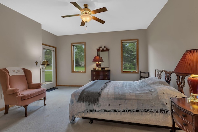 1538 Katrina Ct, Saint Cloud, MN 56301 - bedroom featuring access to outside, carpet flooring, baseboards, and multiple windows