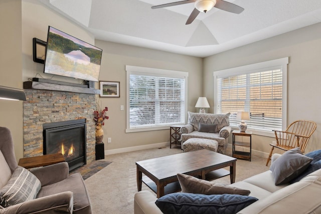 15653 Cobblestone Lake Pkwy, Apple Valley, MN 55124 - carpeted living room featuring a ceiling fan, plenty of natural light, baseboards, and a fireplace