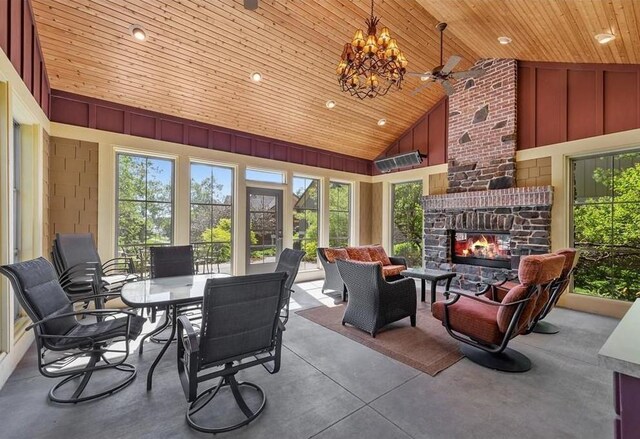15653 Cobblestone Lake Pkwy, Apple Valley, MN 55124 - view of patio / terrace with an outdoor living space with a fireplace, outdoor dining space, and a ceiling fan