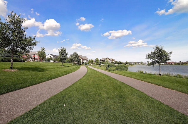 15653 Cobblestone Lake Pkwy, Apple Valley, MN 55124 - surrounding community featuring a lawn, a water view, and a residential view