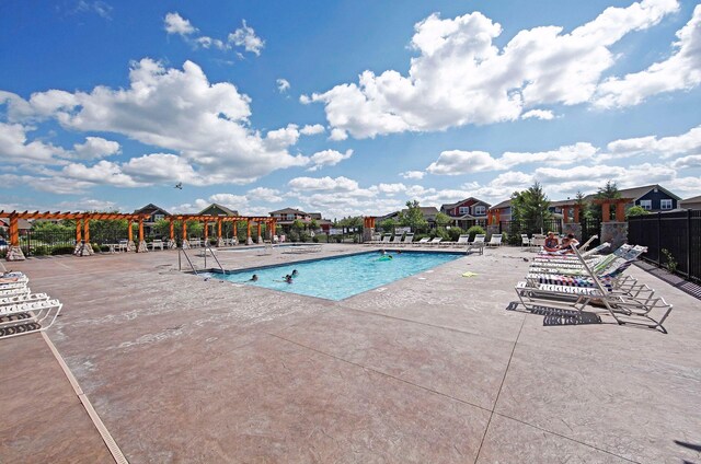 15653 Cobblestone Lake Pkwy, Apple Valley, MN 55124 - community pool featuring a patio