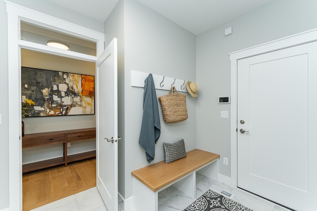 2720 Bentley Dr SW, Rochester, MN 55902 - mudroom with baseboards and light marble finish floors