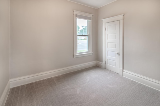 2320 3rd St N, Saint Cloud, MN 56303 - carpeted spare room featuring baseboards