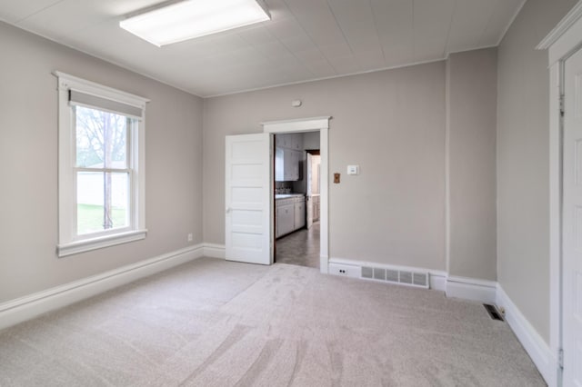 2320 3rd St N, Saint Cloud, MN 56303 - unfurnished room with carpet flooring and baseboards