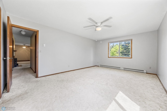2802 29th Ave S, Moorhead, MN 56560 - empty room with ceiling fan, a baseboard heating unit, light colored carpet, and baseboards